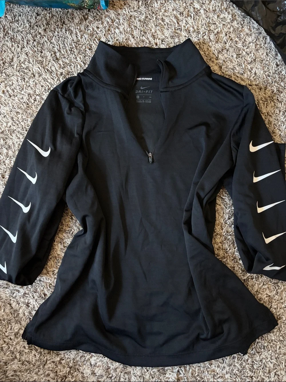 Nike Black Quarter-Zip Women's Performance Top with White Swoosh Accents